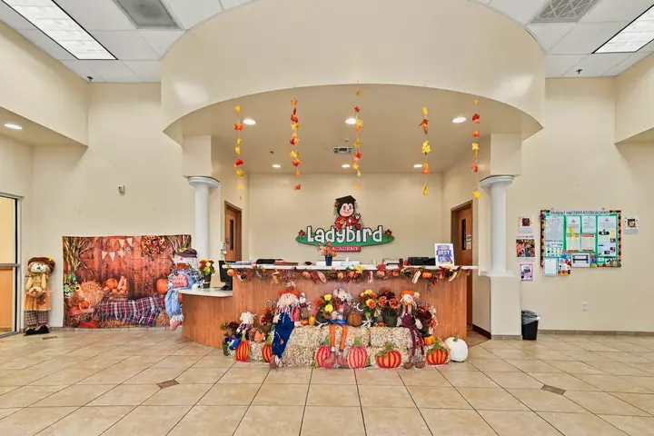 Ladybird Academy front desk decorated for fall