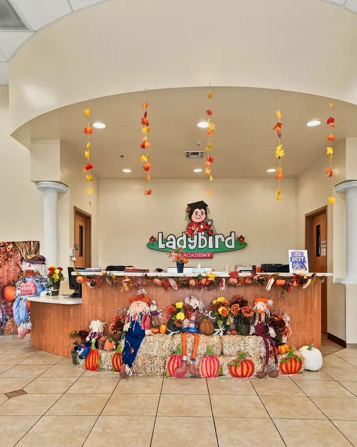 Ladybird Academy front desk decorated for fall