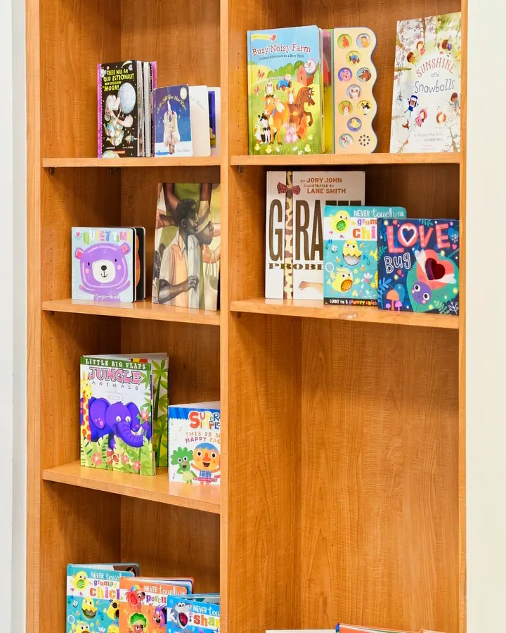 Shelves of colorful picture books in the reading room
