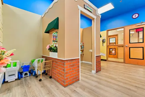 PlayTown shop corner with toy shopping carts