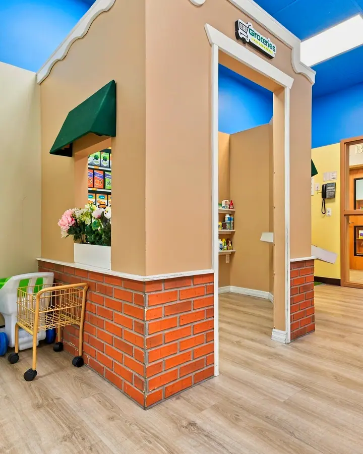 PlayTown shop corner with toy shopping carts