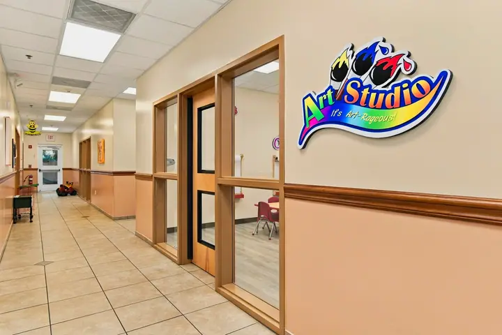 Hallway outside the Art Studio with windows into the classrooms