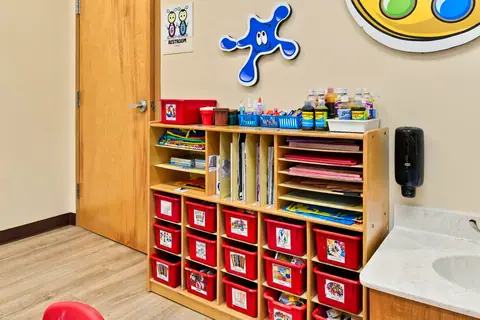 Art Studio cubbies stocked with paint and paper